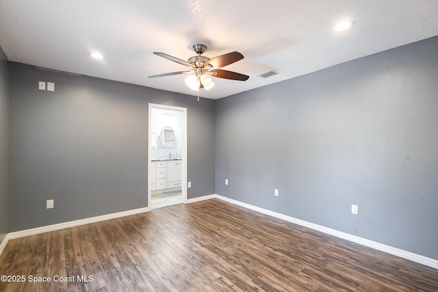 490 Candlestick Ave NE, Palm Bay, FL 32907 - empty room with ceiling fan, baseboards, wood finished floors, and recessed lighting