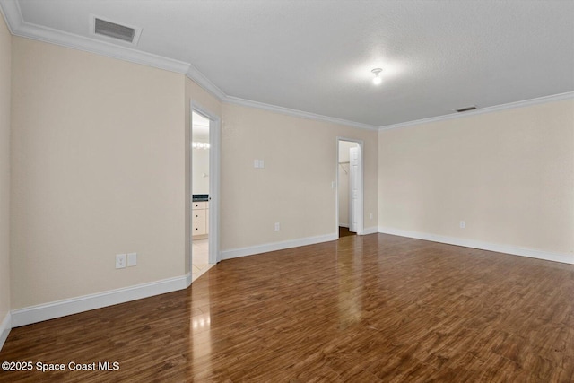 2829 SE Cabana Ln, Port St Lucie, FL 34952 - spare room with ornamental molding, wood finished floors, and baseboards