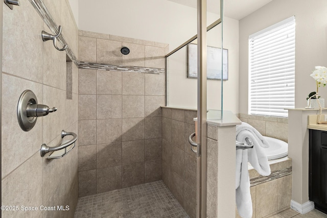 7914 Creshire Ct, Melbourne, FL 32940 - bathroom featuring a stall shower and a garden tub