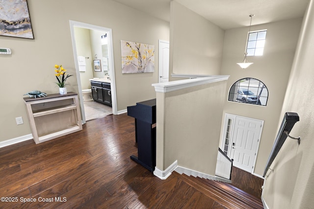 7914 Creshire Ct, Melbourne, FL 32940 - entrance foyer featuring dark wood finished floors and baseboards