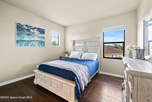 7914 Creshire Ct, Melbourne, FL 32940 - bedroom with baseboards and dark wood finished floors