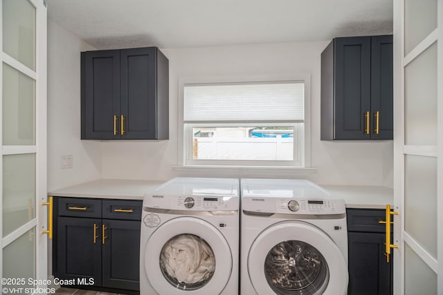 201 NE 3rd St, Satellite Beach, FL 32937 - washroom with cabinet space and separate washer and dryer
