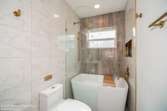 201 NE 3rd St, Satellite Beach, FL 32937 - bathroom with toilet and tile walls