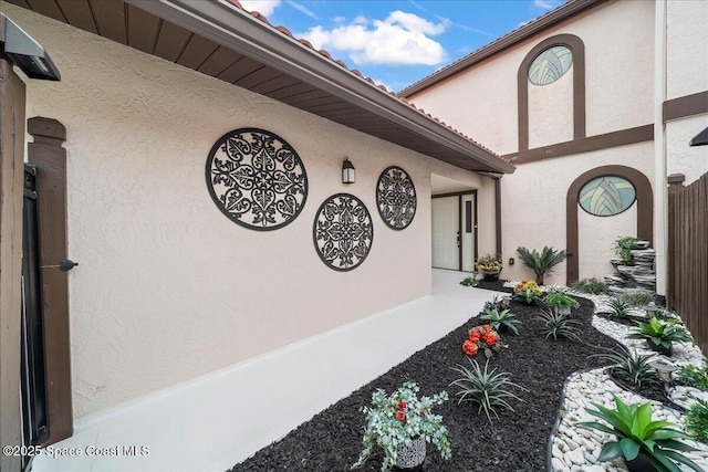 977 Osprey Dr, Melbourne, FL 32940 - property entrance with stucco siding