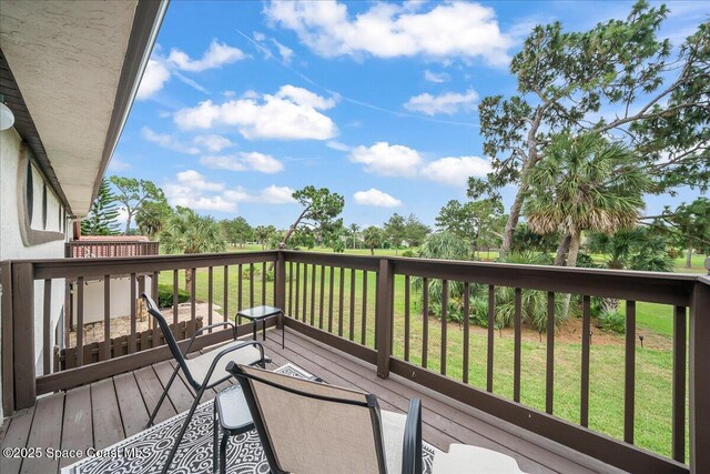 977 Osprey Dr, Melbourne, FL 32940 - deck featuring a lawn