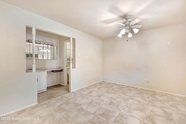211 Naylor Dr, Melbourne, FL 32904 - spare room featuring a ceiling fan and baseboards