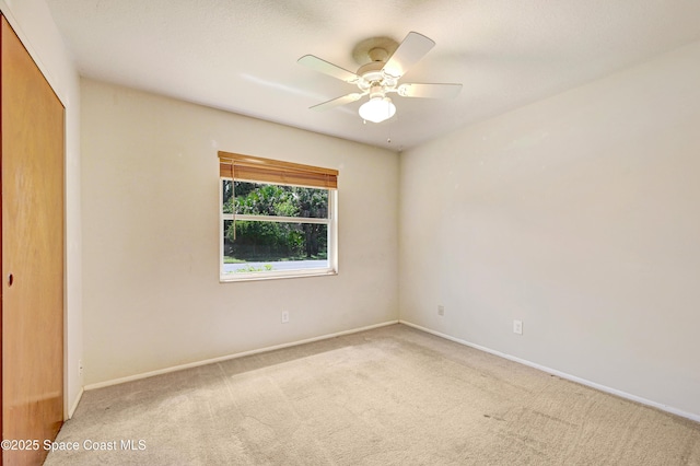 211 Naylor Dr, Melbourne, FL 32904 - unfurnished bedroom with carpet flooring, a closet, and ceiling fan