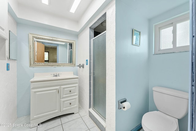 790 Alfonso Ave SE, Palm Bay, FL 32909 - full bathroom featuring toilet, vanity, a shower stall, and tile patterned flooring