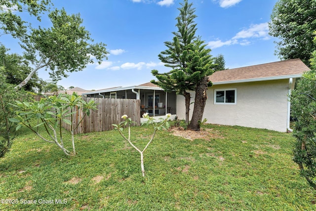 790 Alfonso Ave SE, Palm Bay, FL 32909 - view of yard with a sunroom
