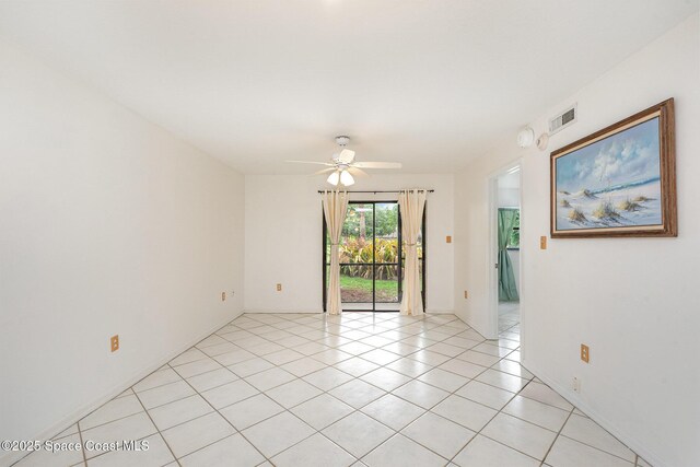 1600 Woodland Dr Unit 4105, Rockledge, FL 32955 - empty room with ceiling fan and light tile patterned floors