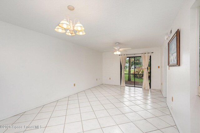 1600 Woodland Dr Unit 4105, Rockledge, FL 32955 - empty room featuring ceiling fan, a chandelier, and light tile patterned floors