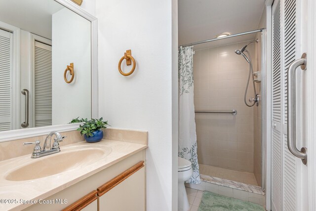 1600 Woodland Dr Unit 4105, Rockledge, FL 32955 - full bath featuring a closet, vanity, tile patterned floors, a tile shower, and toilet