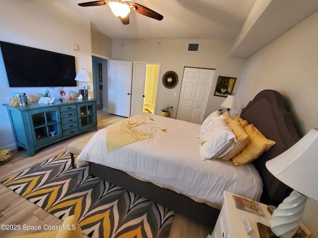 93 Delannoy Ave Unit 601, Cocoa, FL 32922 - bedroom with light wood finished floors, a closet, and ceiling fan