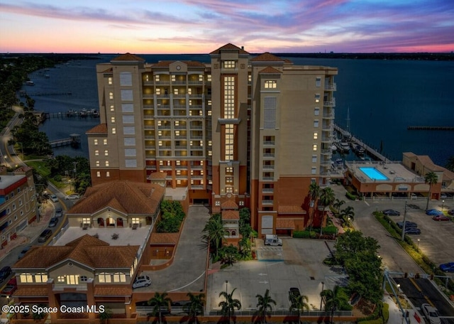 93 Delannoy Ave Unit 601, Cocoa, FL 32922 - view of building exterior featuring a water view