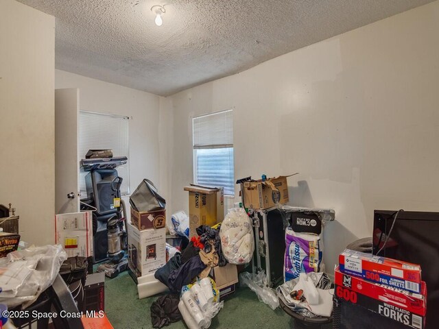 308 N 18th Ct, Ft Pierce, FL 34950 - misc room featuring a textured ceiling and carpet floors