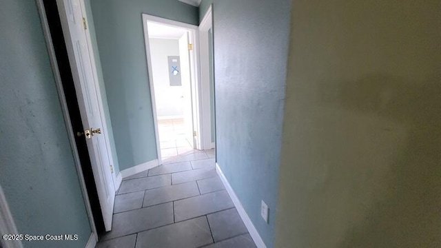1666 Terrace St, Cocoa, FL 32922 - hall featuring baseboards and tile patterned flooring