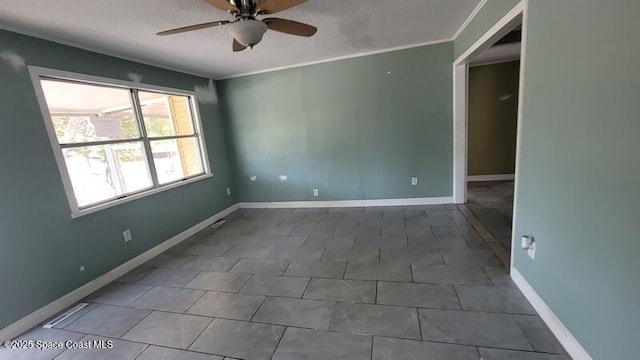 1666 Terrace St, Cocoa, FL 32922 - unfurnished room with ceiling fan, crown molding, and baseboards