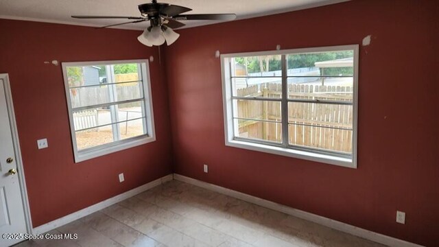 1666 Terrace St, Cocoa, FL 32922 - unfurnished room with a ceiling fan and baseboards