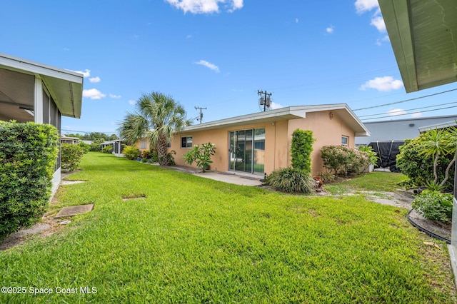 714 Catalina Rd Unit 15, Cocoa Beach, FL 32931 - view of grassy yard