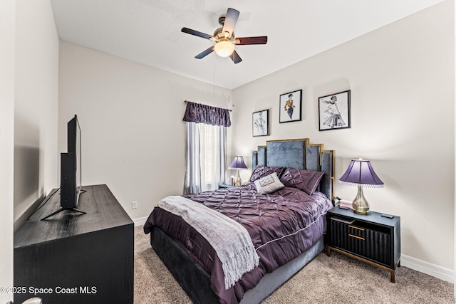 14880 Ellingsworth Ln, Winter Garden, FL 34787 - bedroom featuring carpet, baseboards, and a ceiling fan