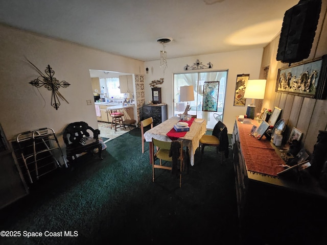 2240 Sea Ave, Indialantic, FL 32903 - view of carpeted dining space