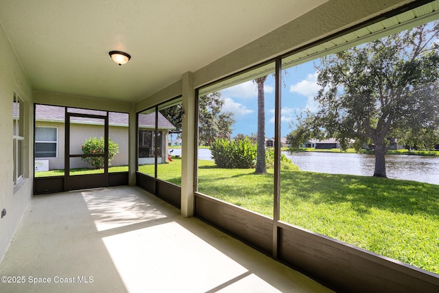1102 Bainbury Ln, Melbourne, FL 32904 - unfurnished sunroom featuring a water view