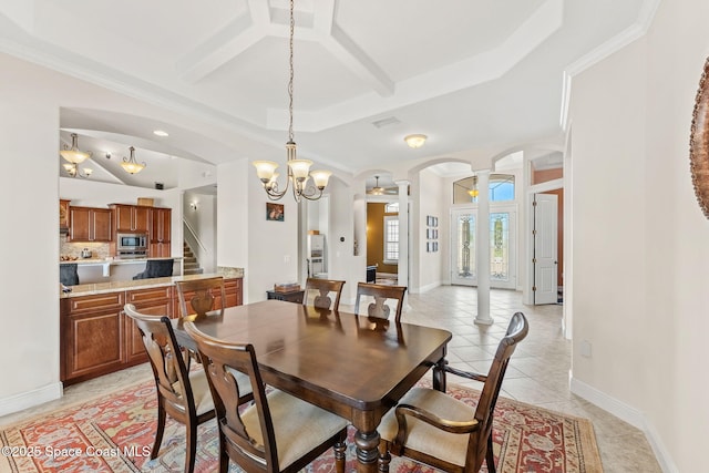 4022 Tradewinds Trl, Merritt Island, FL 32953 - dining space with ornate columns, arched walkways, light tile patterned floors, coffered ceiling, and recessed lighting