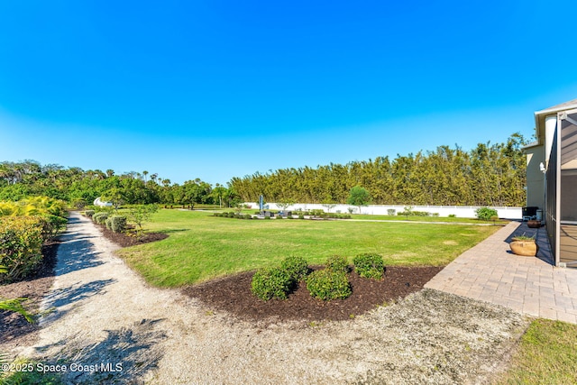 4022 Tradewinds Trl, Merritt Island, FL 32953 - view of yard featuring a patio