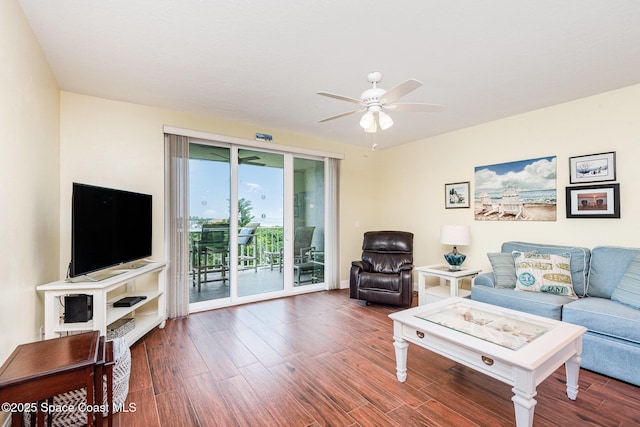 8700 Ridgewood Ave Unit Ph2B, Cape Canaveral, FL 32920 - living room featuring a ceiling fan and wood finished floors