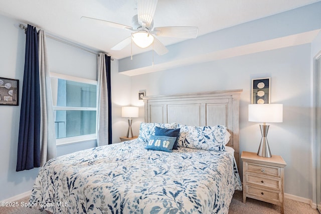 8700 Ridgewood Ave Unit Ph2B, Cape Canaveral, FL 32920 - carpeted bedroom with baseboards and a ceiling fan