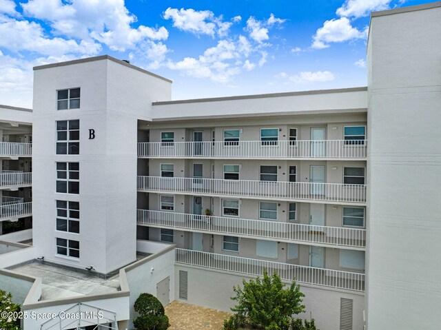 8700 Ridgewood Ave Unit Ph2B, Cape Canaveral, FL 32920 - view of apartment building / complex