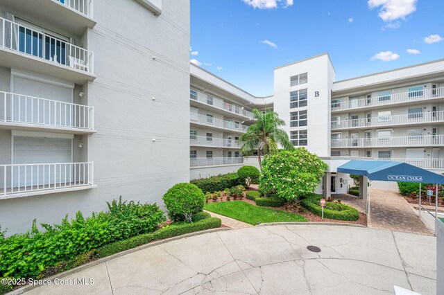 8700 Ridgewood Ave Unit Ph2B, Cape Canaveral, FL 32920 - view of apartment building / complex