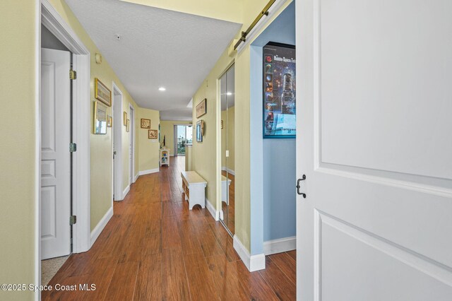 8700 Ridgewood Ave Unit Ph2B, Cape Canaveral, FL 32920 - corridor featuring wood finished floors and recessed lighting
