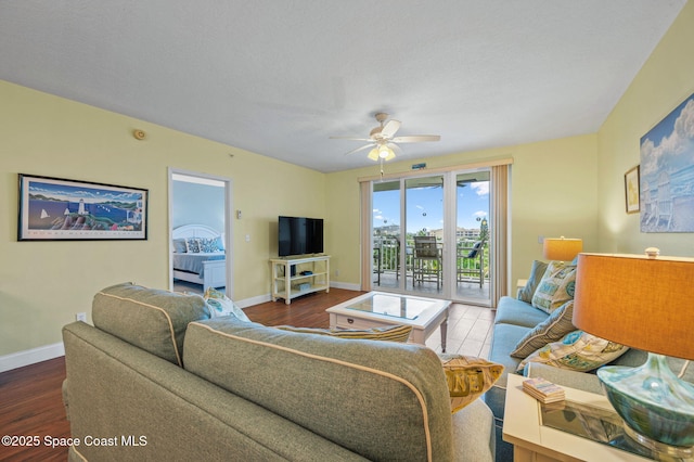 8700 Ridgewood Ave Unit Ph2B, Cape Canaveral, FL 32920 - living area featuring ceiling fan and wood finished floors