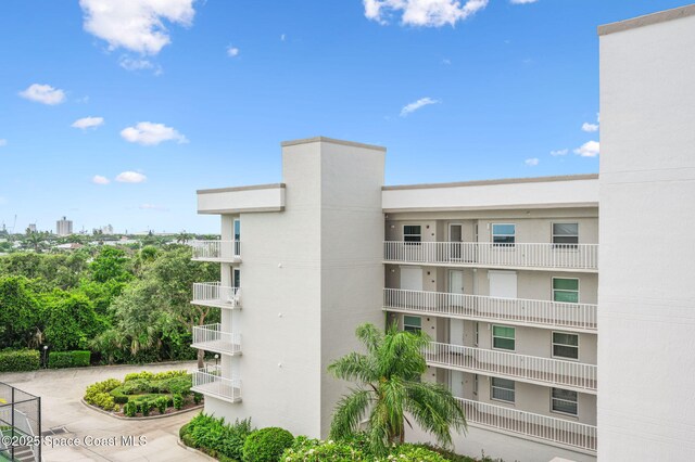 8700 Ridgewood Ave Unit Ph2B, Cape Canaveral, FL 32920 - view of apartment building / complex