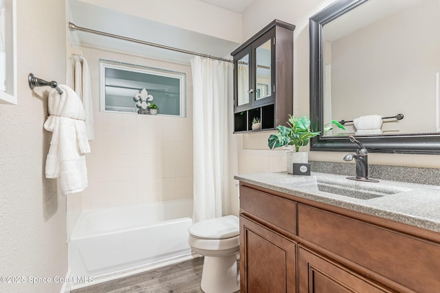 761 Bywood Dr NE, Palm Bay, FL 32905 - bathroom featuring vanity, wood finished floors, and shower / bath combo with shower curtain