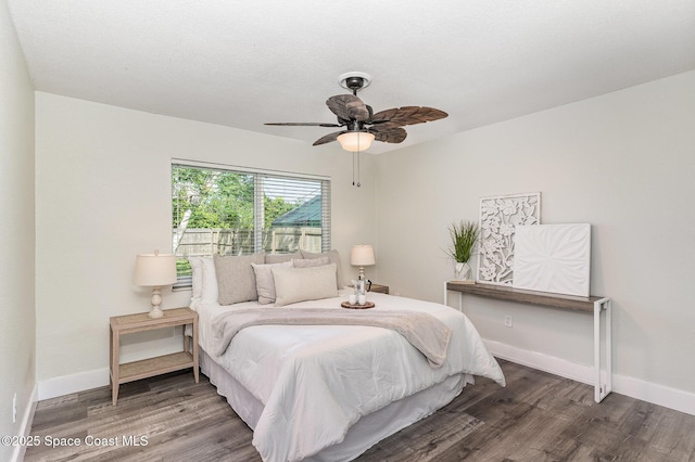 761 Bywood Dr NE, Palm Bay, FL 32905 - bedroom with wood finished floors and a ceiling fan