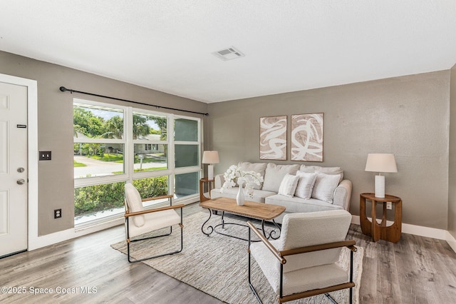 761 Bywood Dr NE, Palm Bay, FL 32905 - living room with wood finished floors and baseboards