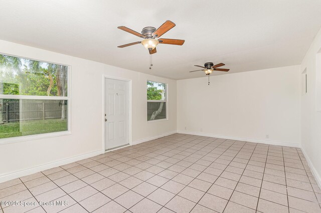 761 Bywood Dr NE, Palm Bay, FL 32905 - unfurnished room with ceiling fan and baseboards