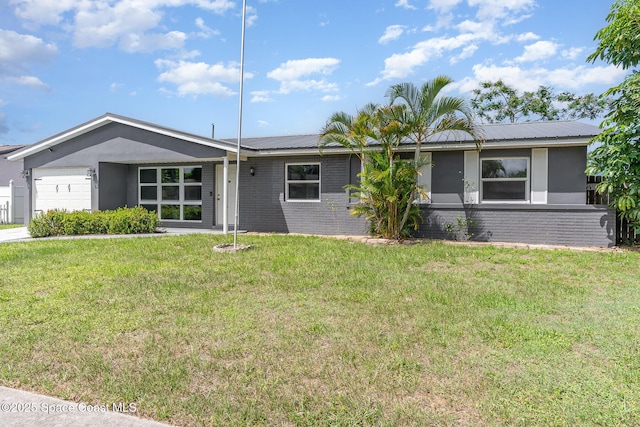 761 Bywood Dr NE, Palm Bay, FL 32905 - ranch-style home with brick siding, a garage, and a front lawn