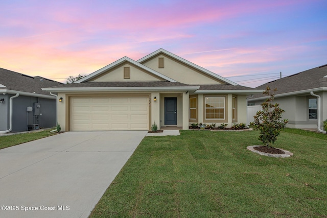 1331 Tupelo Cir, Cocoa, FL 32926 - ranch-style house featuring stucco siding, driveway, a lawn, and a garage