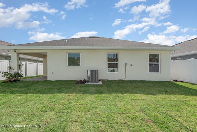 1331 Tupelo Cir, Cocoa, FL 32926 - back of house with stucco siding and central AC unit