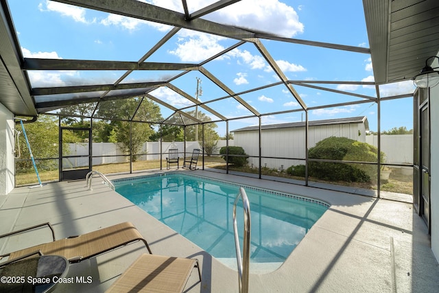 16190 SW 16th Ct, Ocala, FL 34473 - view of pool featuring a patio area, a fenced backyard, and a lanai