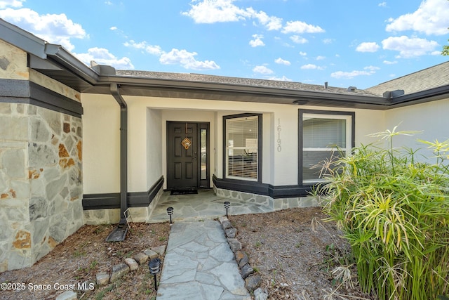 16190 SW 16th Ct, Ocala, FL 34473 - property entrance with covered porch and stucco siding