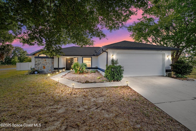 16190 SW 16th Ct, Ocala, FL 34473 - single story home with a garage, concrete driveway, and stucco siding