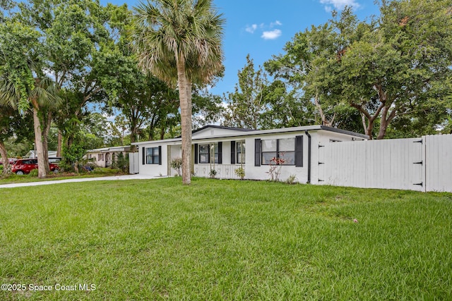 287 Edward Rd, Melbourne, FL 32904 - view of front of property featuring a gate