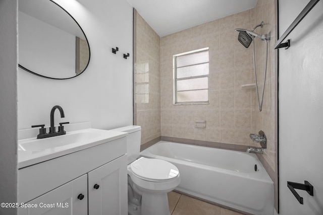 287 Edward Rd, Melbourne, FL 32904 - bathroom featuring  shower combination, vanity, toilet, and tile patterned floors