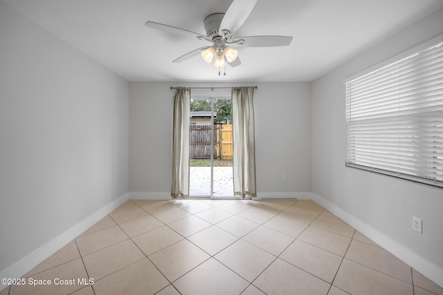 287 Edward Rd, Melbourne, FL 32904 - empty room featuring ceiling fan, light tile patterned flooring, and baseboards
