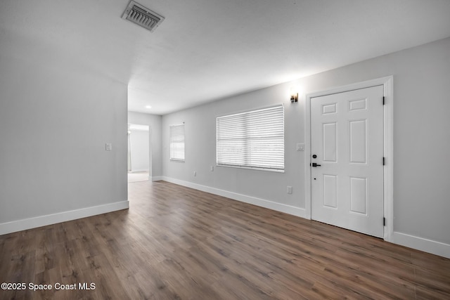 287 Edward Rd, Melbourne, FL 32904 - entrance foyer with wood finished floors and baseboards