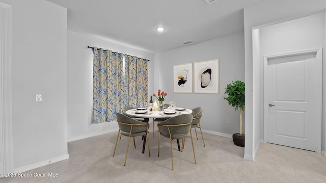 837 Wakaw Ln SW, Palm Bay, FL 32908 - dining space with baseboards and recessed lighting